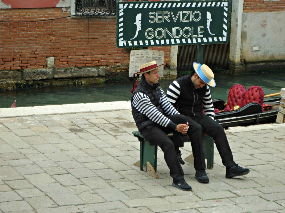 Gondoliers on a Break in Venice