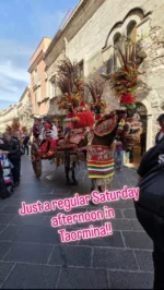 This parade has been going up and down Cirdo Umberto in Taormina all afternoon!! Lots of drums, dancing and horses wearing more flowers than any horse is meant to!! I'm still not sure what it's all about - but is that important??.#taorminasicily #taormina #cittataormina #solotravel #solotravelinitaly #solotrip #solotravelinsicily #seetheworldthroughmyeyes #traveltheworldwithme